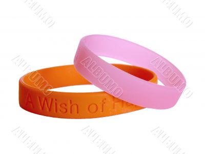 Silicone wristbands together orange and pink