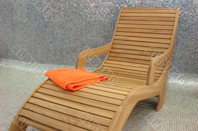 relax chair with orange Towel