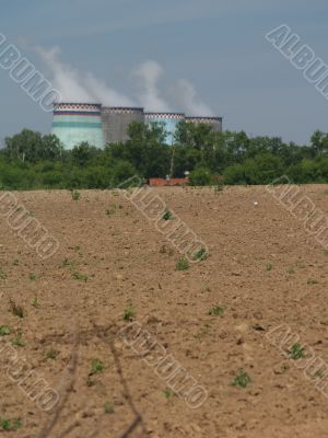 Pipes on a background of the ploughed field