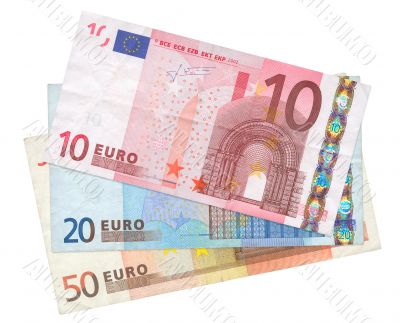 three Euro banknotes