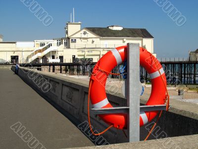 Seaside pier and lifebelt