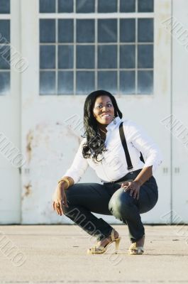 African American Woman in front of Hangar