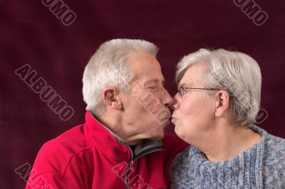Kissing older couple Kissing older couple