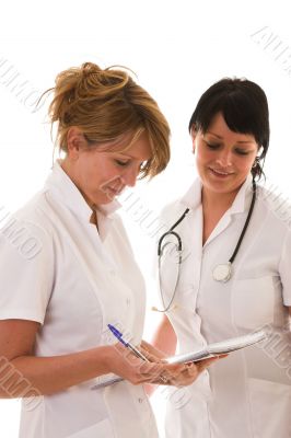 Nurses checking out the notes