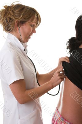 Nurse listening to her patients breating