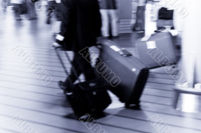 people traveling at the airport