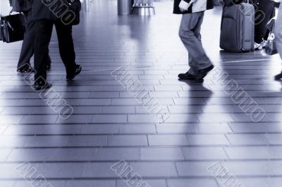 people traveling at the airport