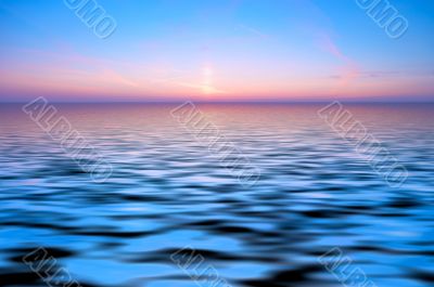 abstract ocean and sunset background