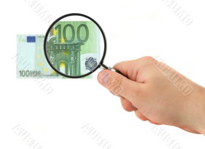 hand magnifying 100 Euro note