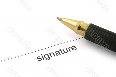 signature and ballpoint pen