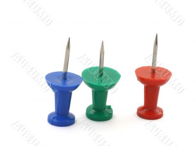 three thumbtacks