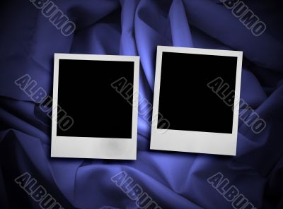 two photo frames on satin