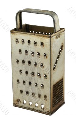 old rusty grater on white