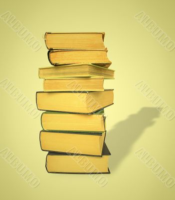 stack of old books with shadow