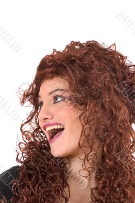 Beautiful teenager wearing a curly wig