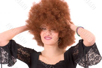 Pretty teenager with afro wig