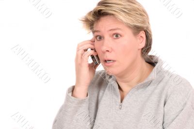 Woman looking totally shocked at the news