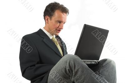 Business man typing relaxed