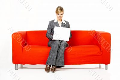 Woman on red couch