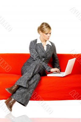 Woman on red couch