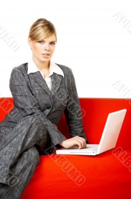 Woman on red couch