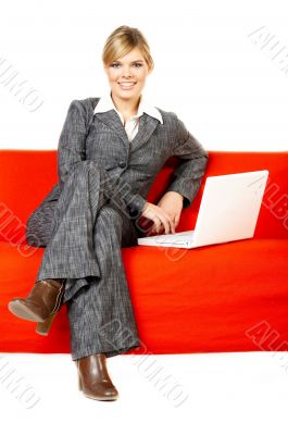 Woman on red couch