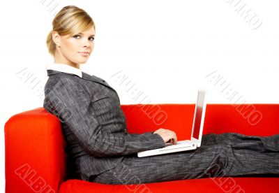 Woman on red couch