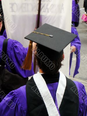 Graduate In Gown Marching In Procession