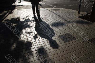 shadow, urban, barcelona, man, and street