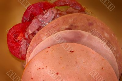 Sandwich with sausage and tomatoes