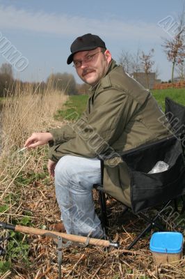 Fisherman waiting for the fish to bite