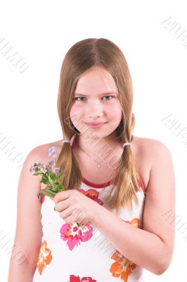 Pretty little girl holding a few forget-me-nots