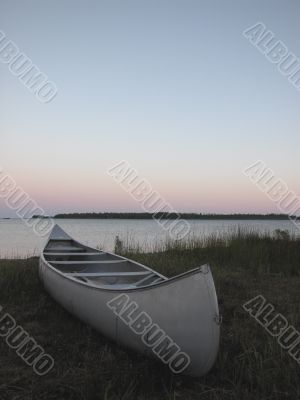 canoe on beach at sunset canoe on beach at sunset