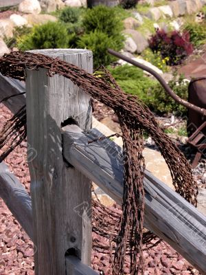 Rusted wire on fence