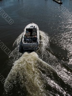 Motor boat with wake Motor boat with wake