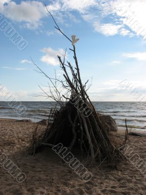 a hut on the shore