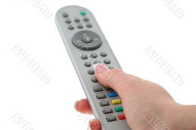 female hand with remote control