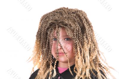 Girl dressed up with a funny rasta wig