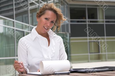 Businesswoman working outdoors