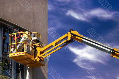 Worker on a high lift