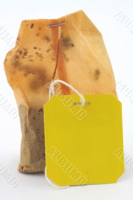 used tea bag with an empty tag