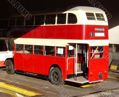 Old bus caught half in shadow