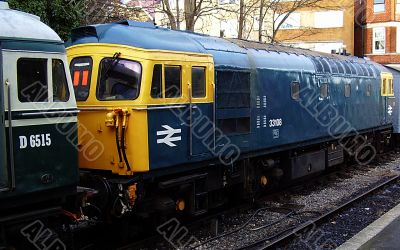 Blue and yellow heritage diesel train