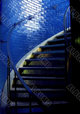 Spiral staircase and stark blue walls Spiral staircase and stark blue walls