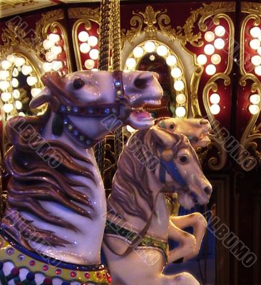 horses on carousel ride