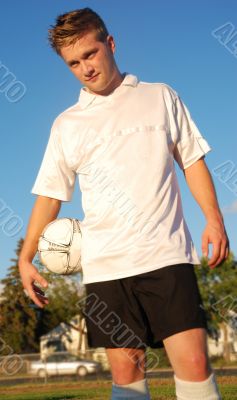 A soccer player in a field A soccer player in a field