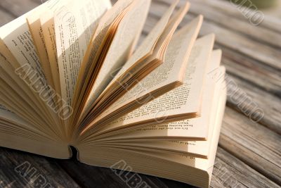 book on a table in perespective