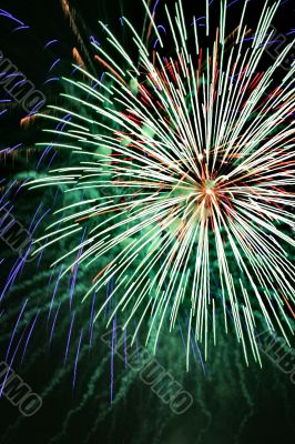 Night celebration fireworks upon dark sky