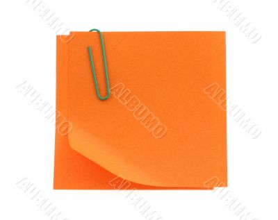 orange post-it notes with a bent corner on white