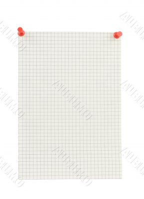 piece of squared paper thumbthacked to white wall
